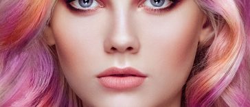 Beauty fashion model girl with colorful dyed hair