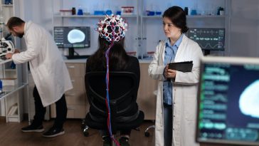 Specialist researcher doctor monitoring brain activity evolution